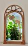 Arched Spanish wall mirror in rattan and bamboo, 1960s.