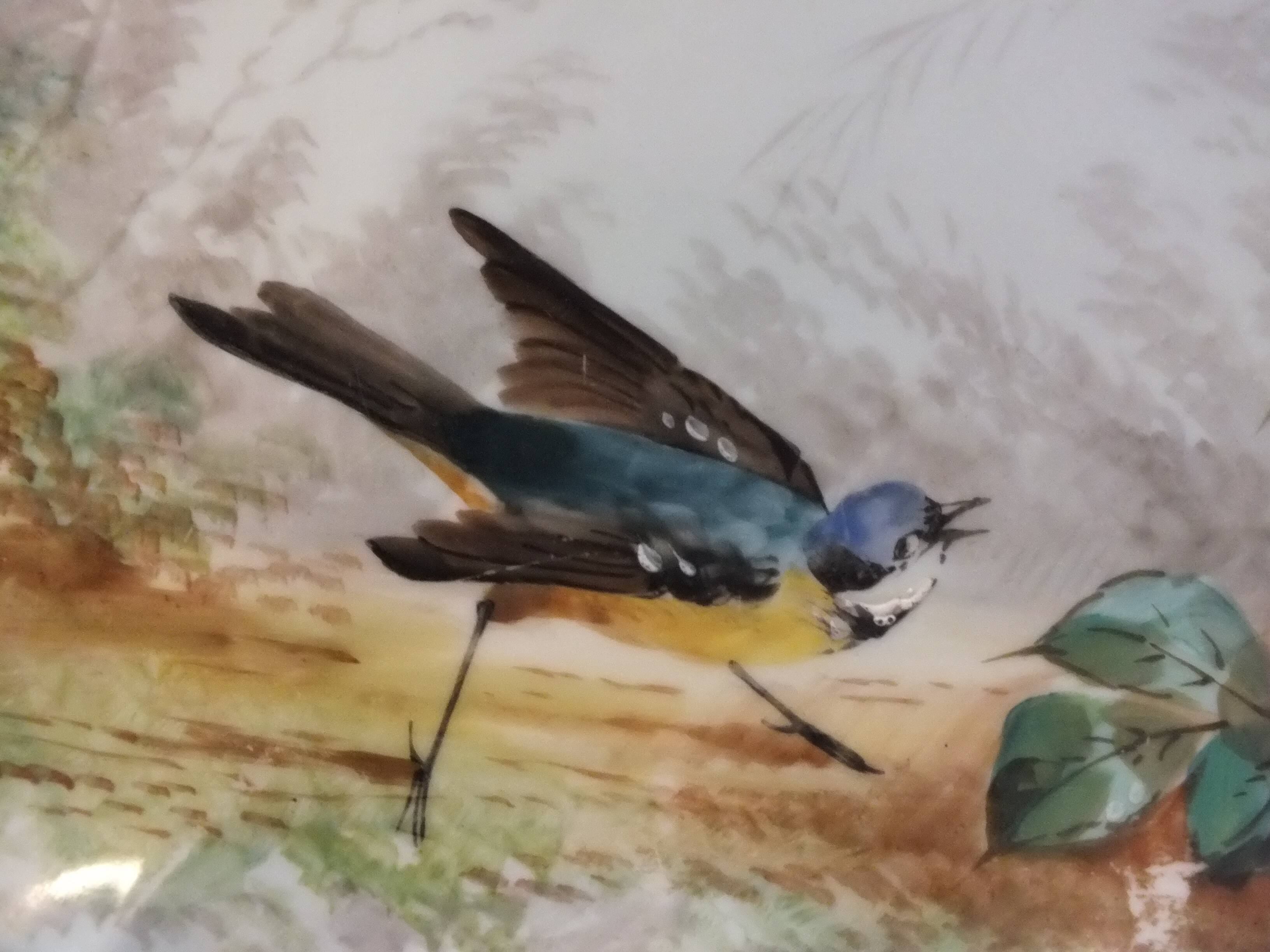 Pair of small porcelain dishes painted with birds and flowers 19th