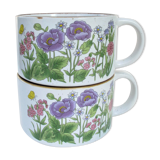 Vintage sandstone cups with flowers