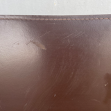 Fauteuil en cuir ancien