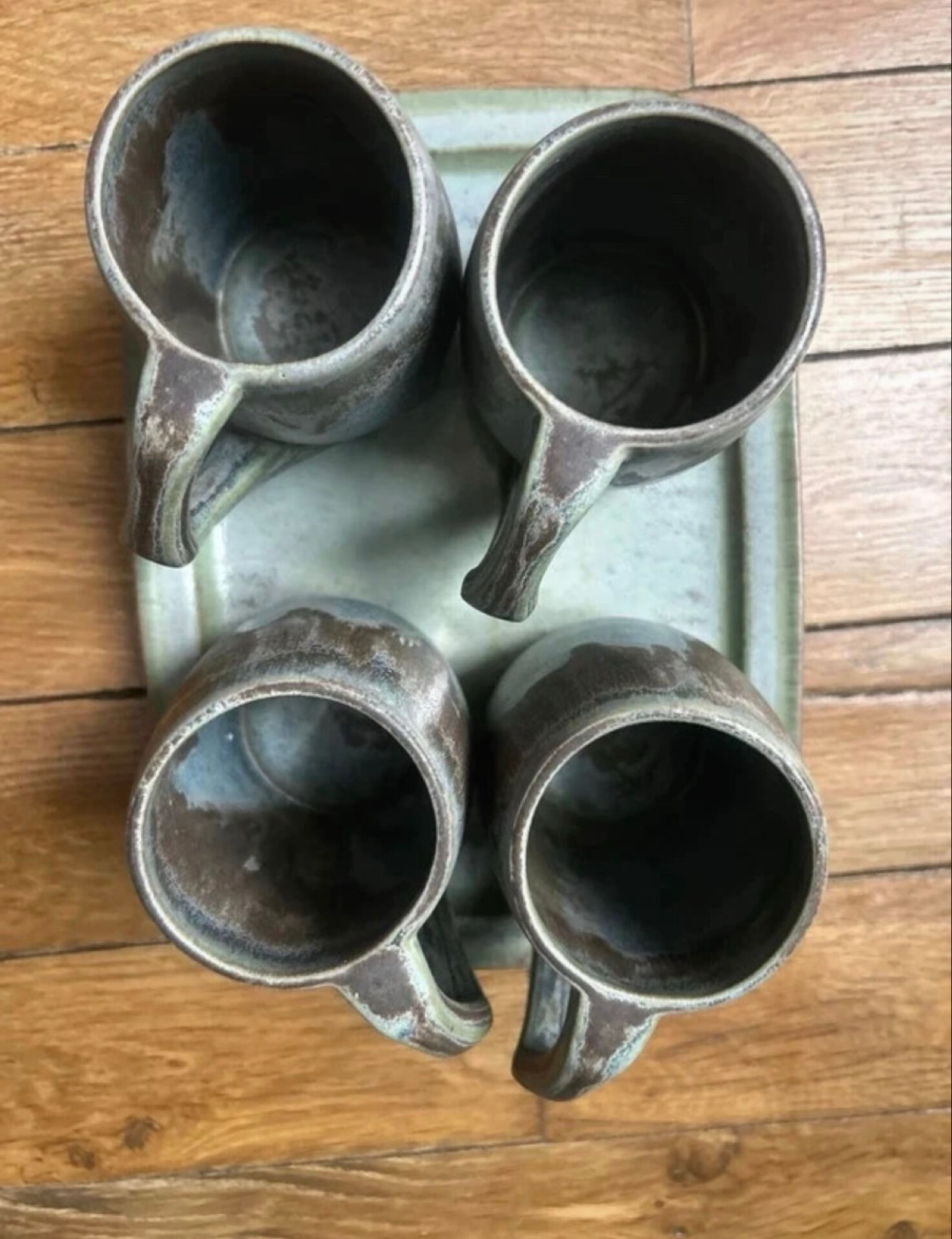 Set of 4 cups and 1 signed brutalist tray.