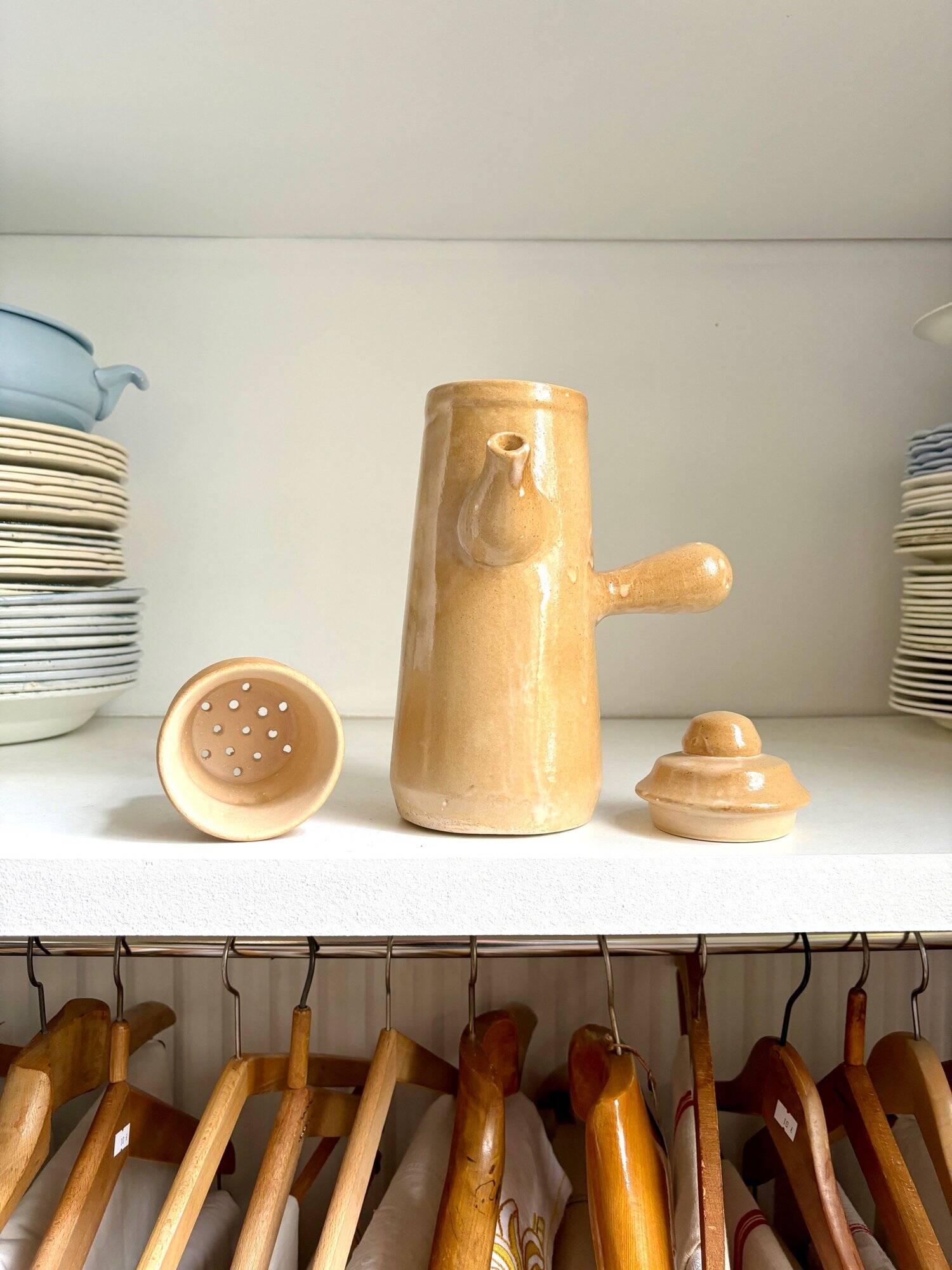 Beige enameled stoneware teapot