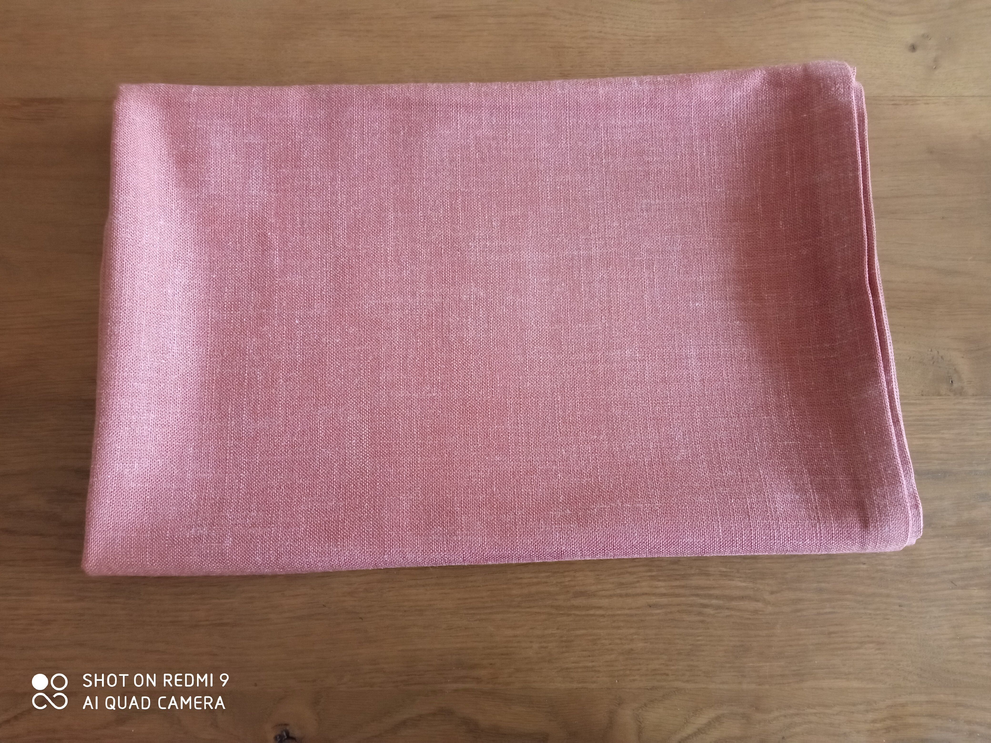 Old pink vintage tablecloth
