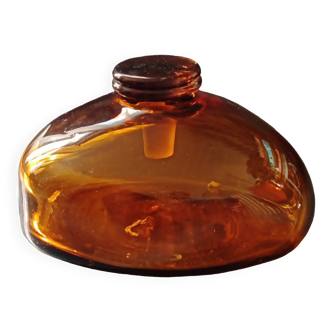 Old perfume or apothecary bottle, amber material