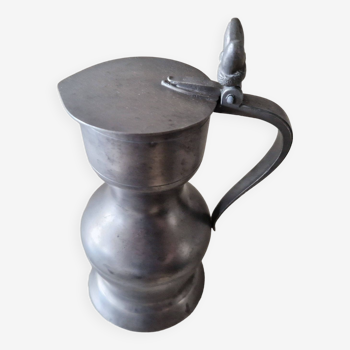 Pewter pitcher of the dolphin Legal title