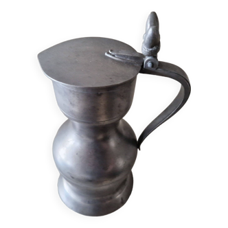 Pewter pitcher of the dolphin Legal title