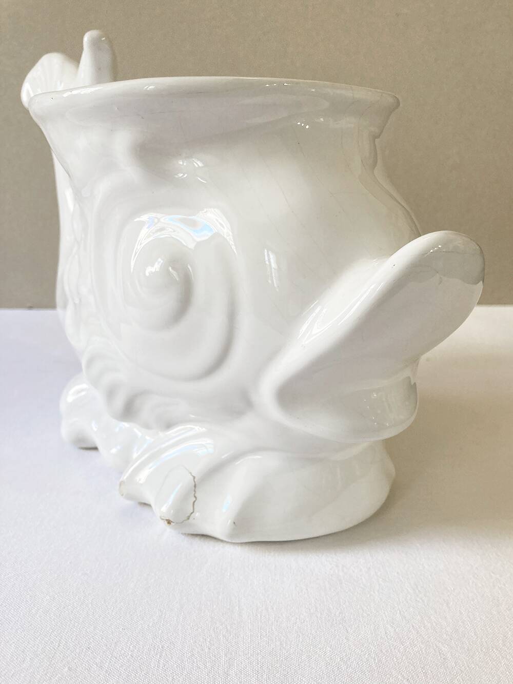 White ceramic fish plant pot