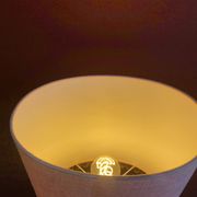 Copper "bouillotte" lamp with Ashoka Silk shade, pom-poms of c
