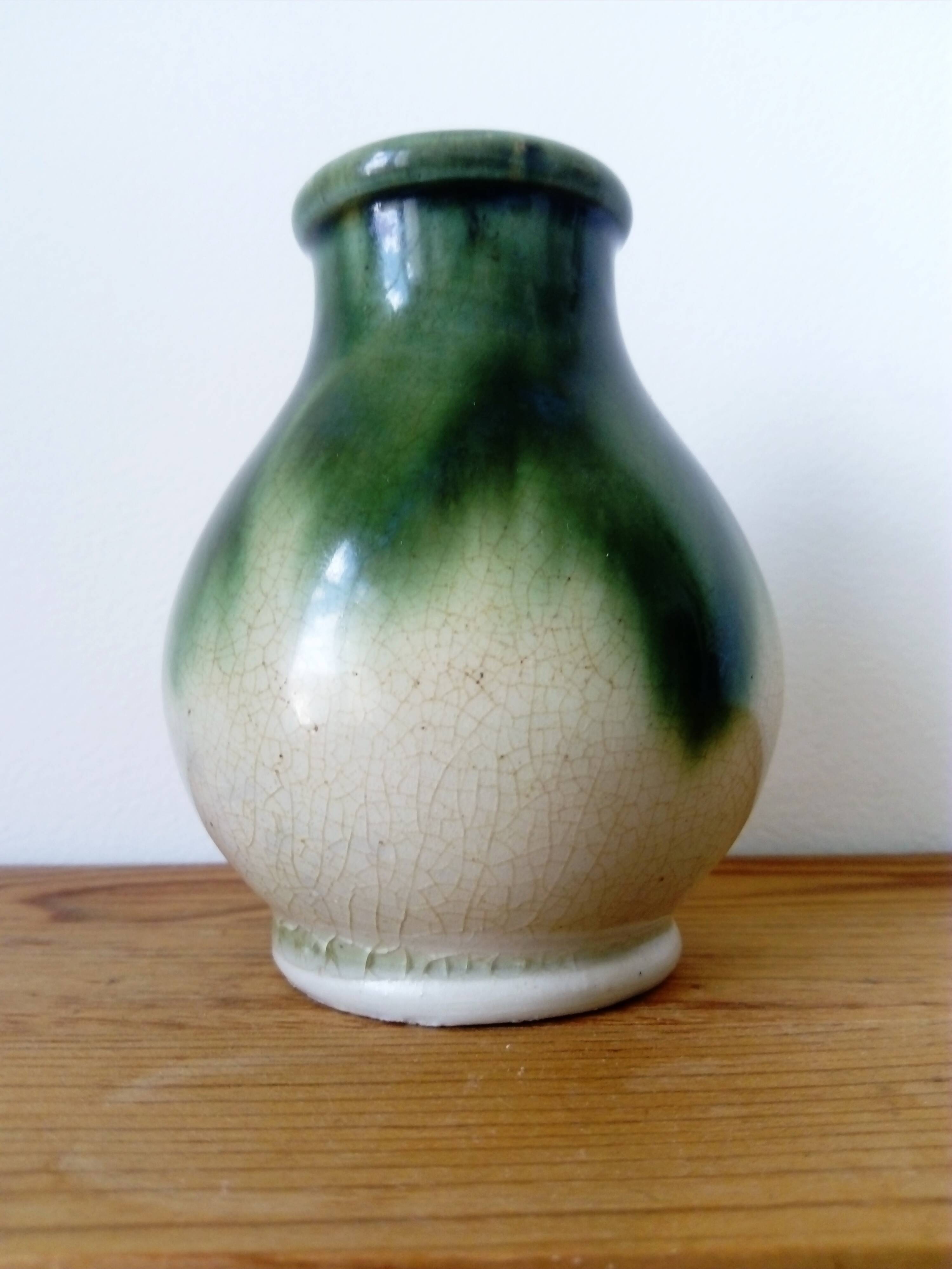 small green and cream glazed ceramic vase
