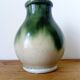 small green and cream glazed ceramic vase