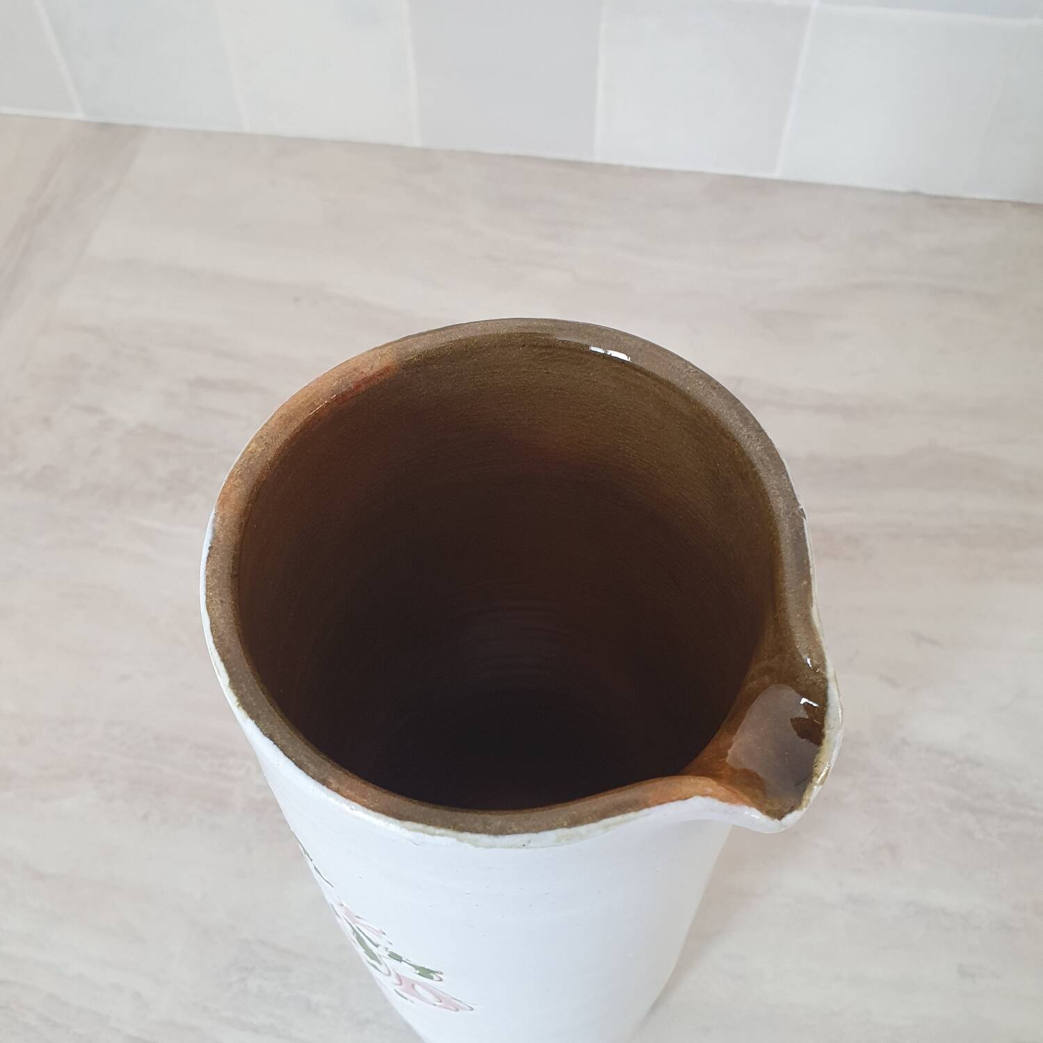 Large white jug with a pink pattern