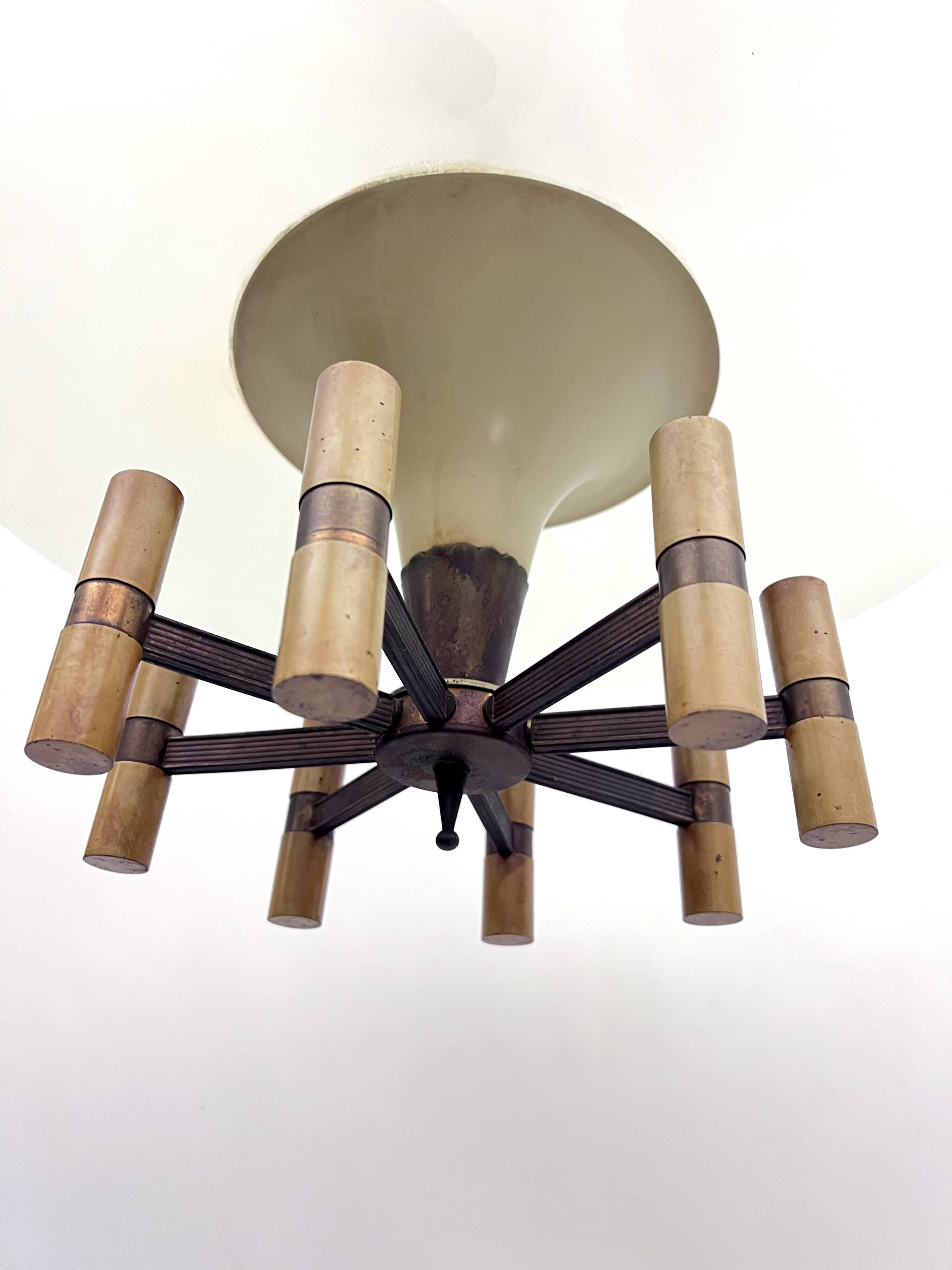 Curved glass disk chandelier. Italy 1950s