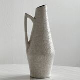 Ceramic flower pitcher.