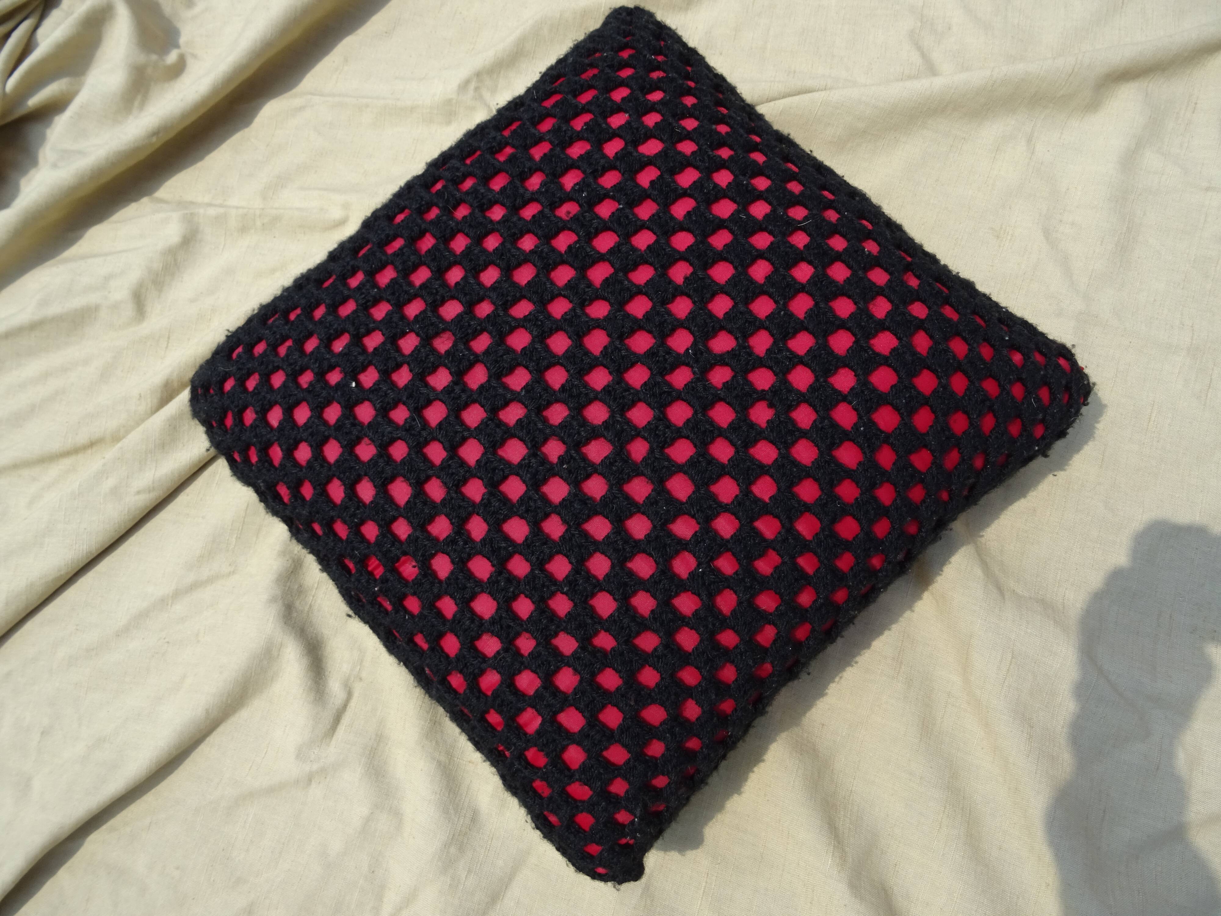 Wool cushion with vintage crochet