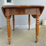 Cherry wood shuttered table.