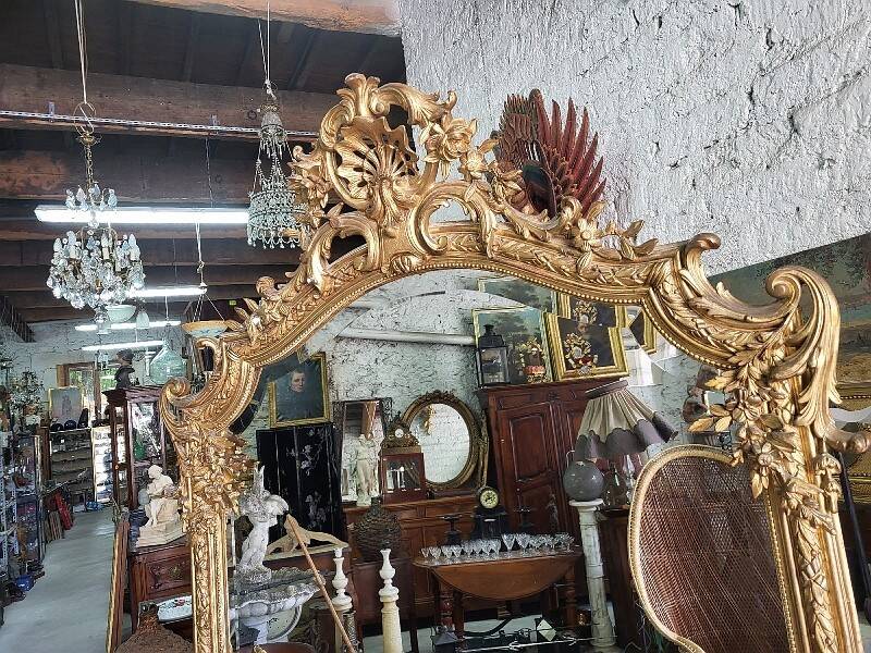 Large Louis XV gilded shell mirror from the 19th century