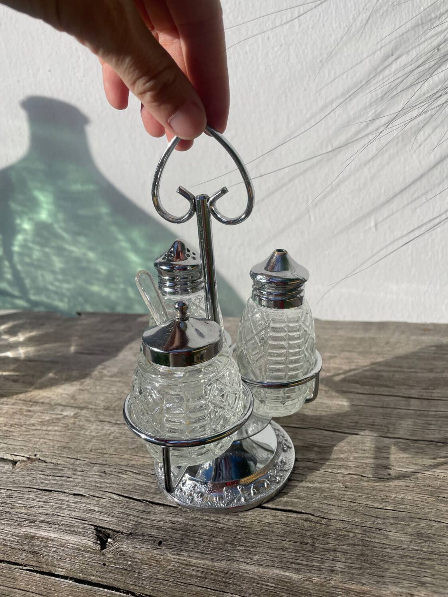 Silver-plated metal and glass salt and pepper shakers