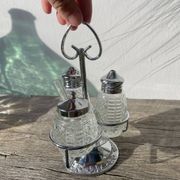 Silver-plated metal and glass salt and pepper shakers