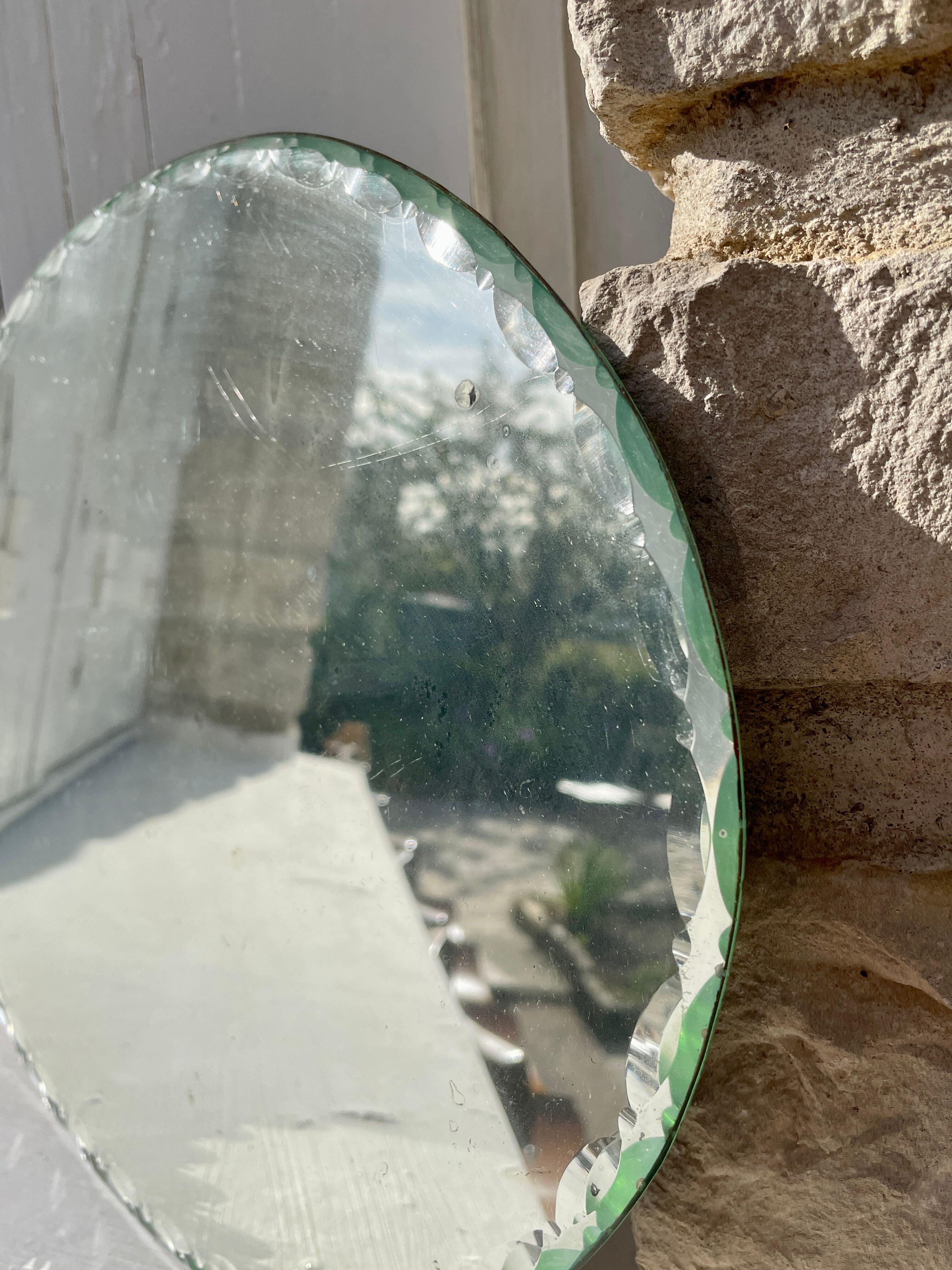 Vintage beveled mirror with mercury