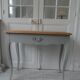 Console, side desk of beautiful craftsmanship re-enchanted in verdigris