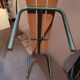 Former vintage wooden school bench and metal tubes