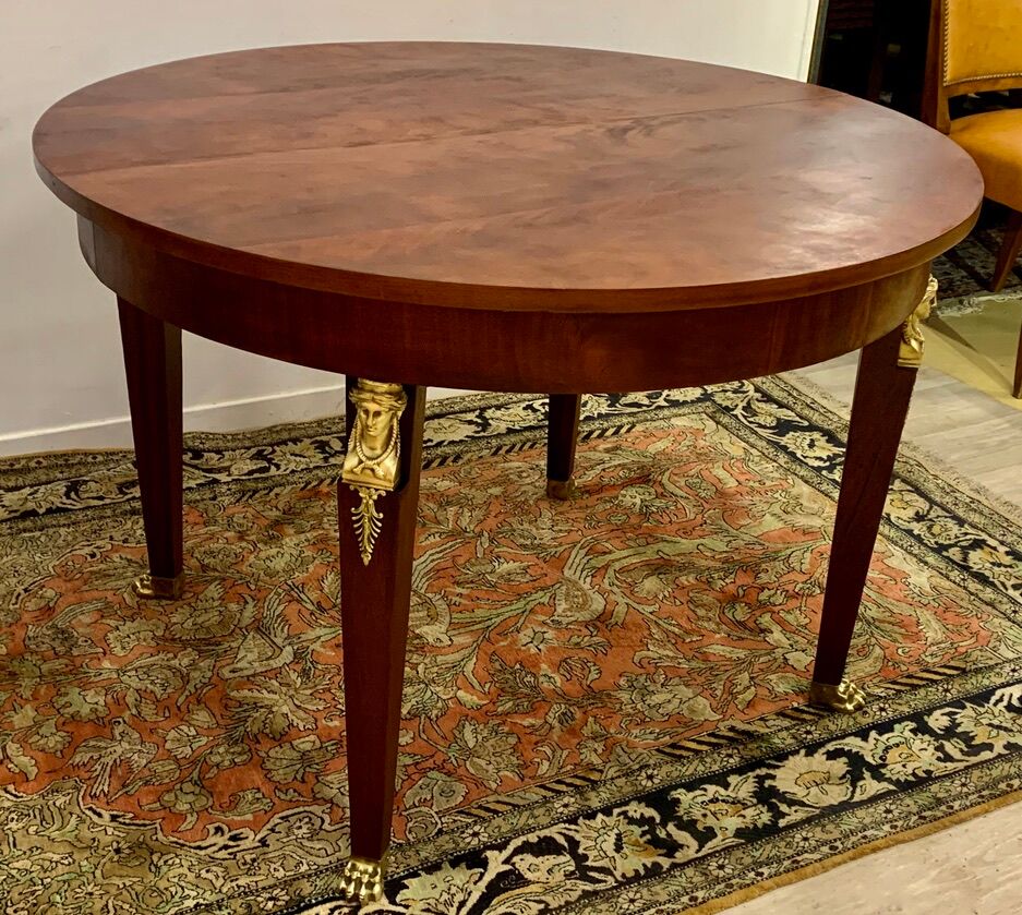 Empire style round table in mahogany