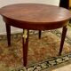 Empire style round table in mahogany