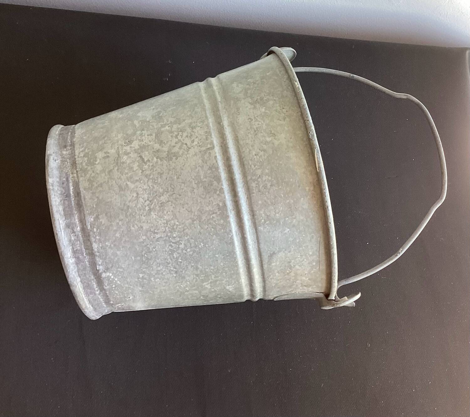 Old small galvanized steel bucket