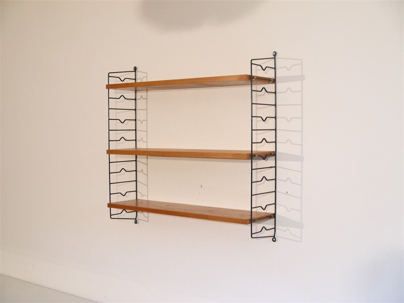 Scandinavian vintage shelf in teak "string" 1960