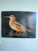 Wood painting of birds