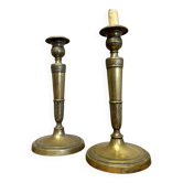 Paire de bougeoirs époque Empire en bronze doré vers 1820