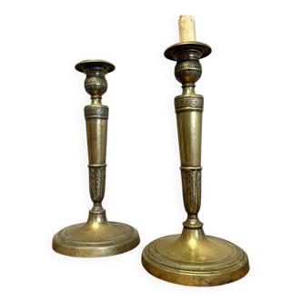 Paire de bougeoirs époque Empire en bronze doré vers 1820