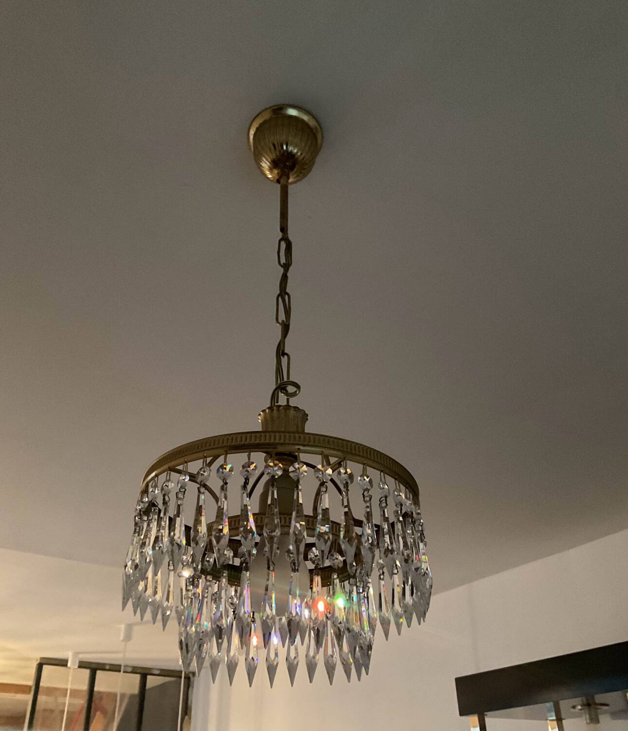 Cascade chandelier with crystal and brass tassels