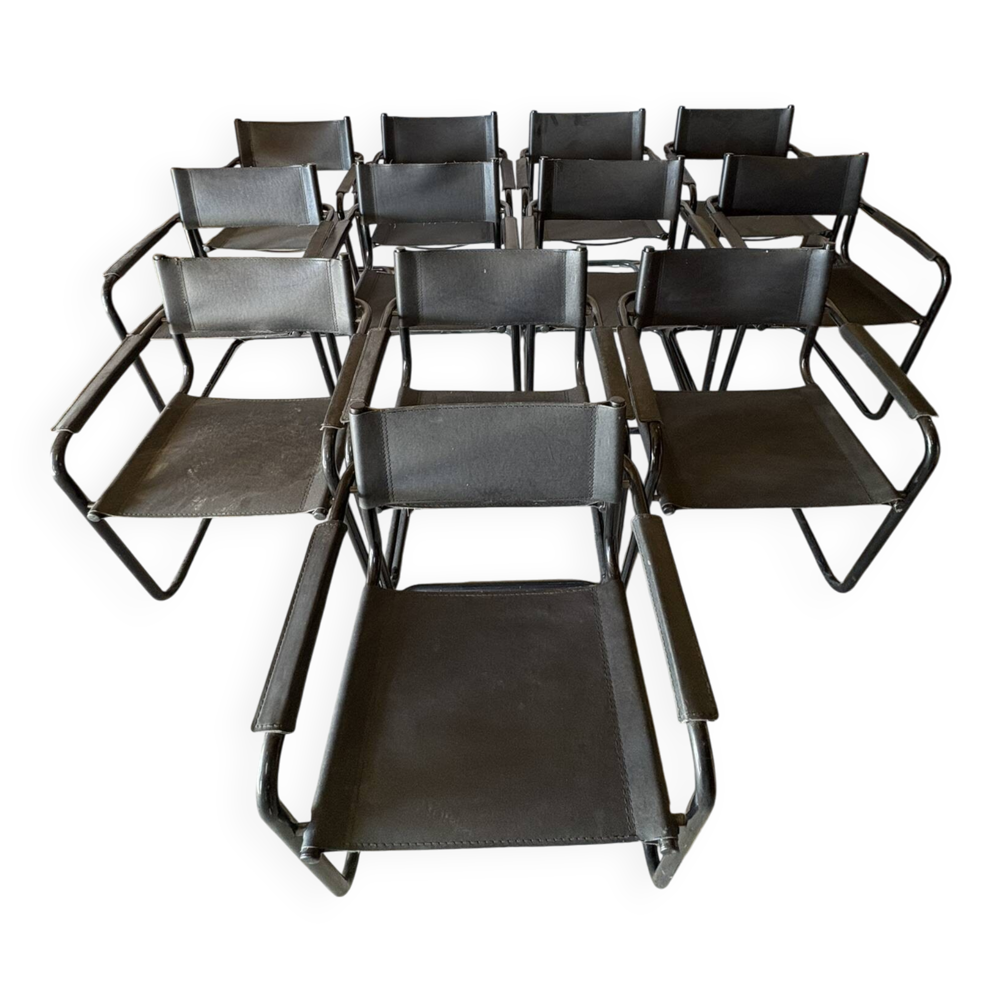 Set of 12 vintage chairs in black leather and tubular steel – Italy, 1970s