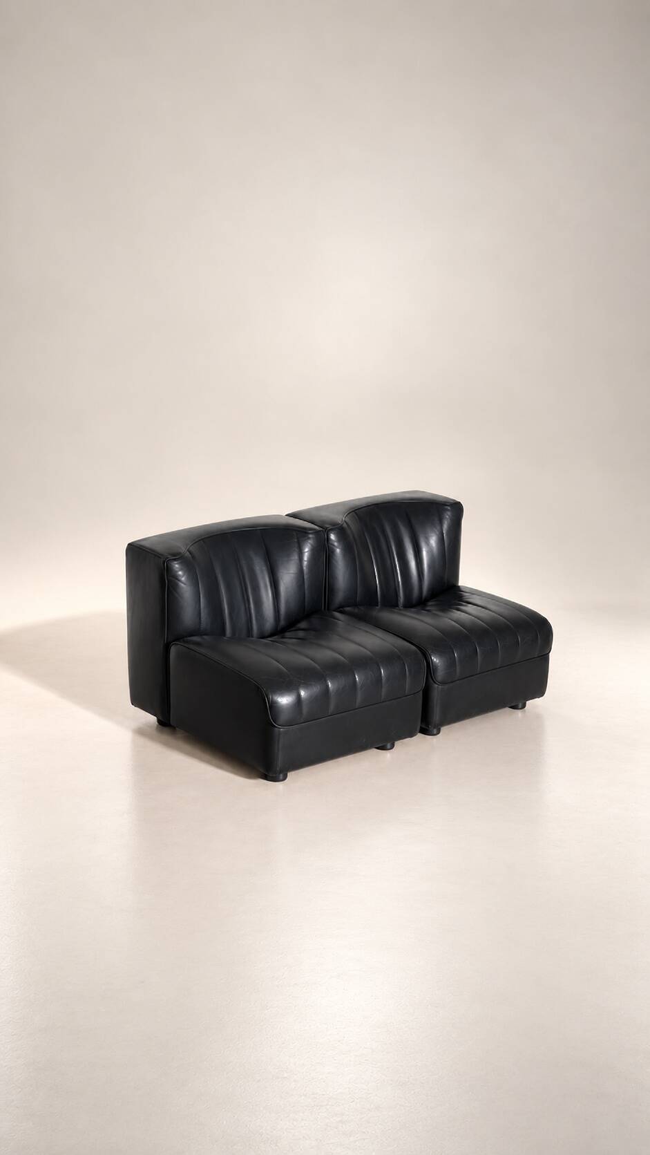 Modular black leather sofa '9000' by Tito Agnoli