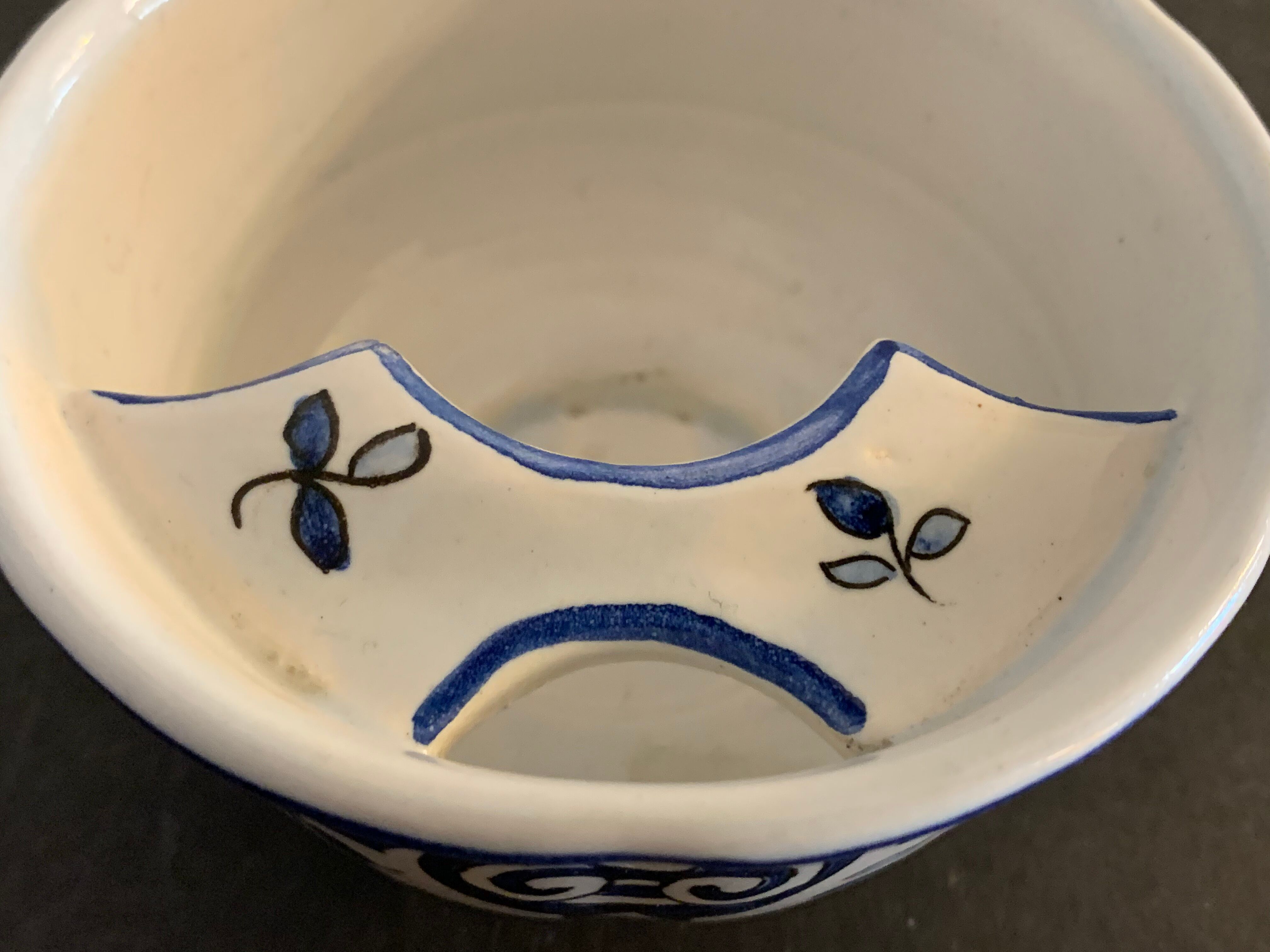 Old mustache cup and its under cup, Rouen earthenware