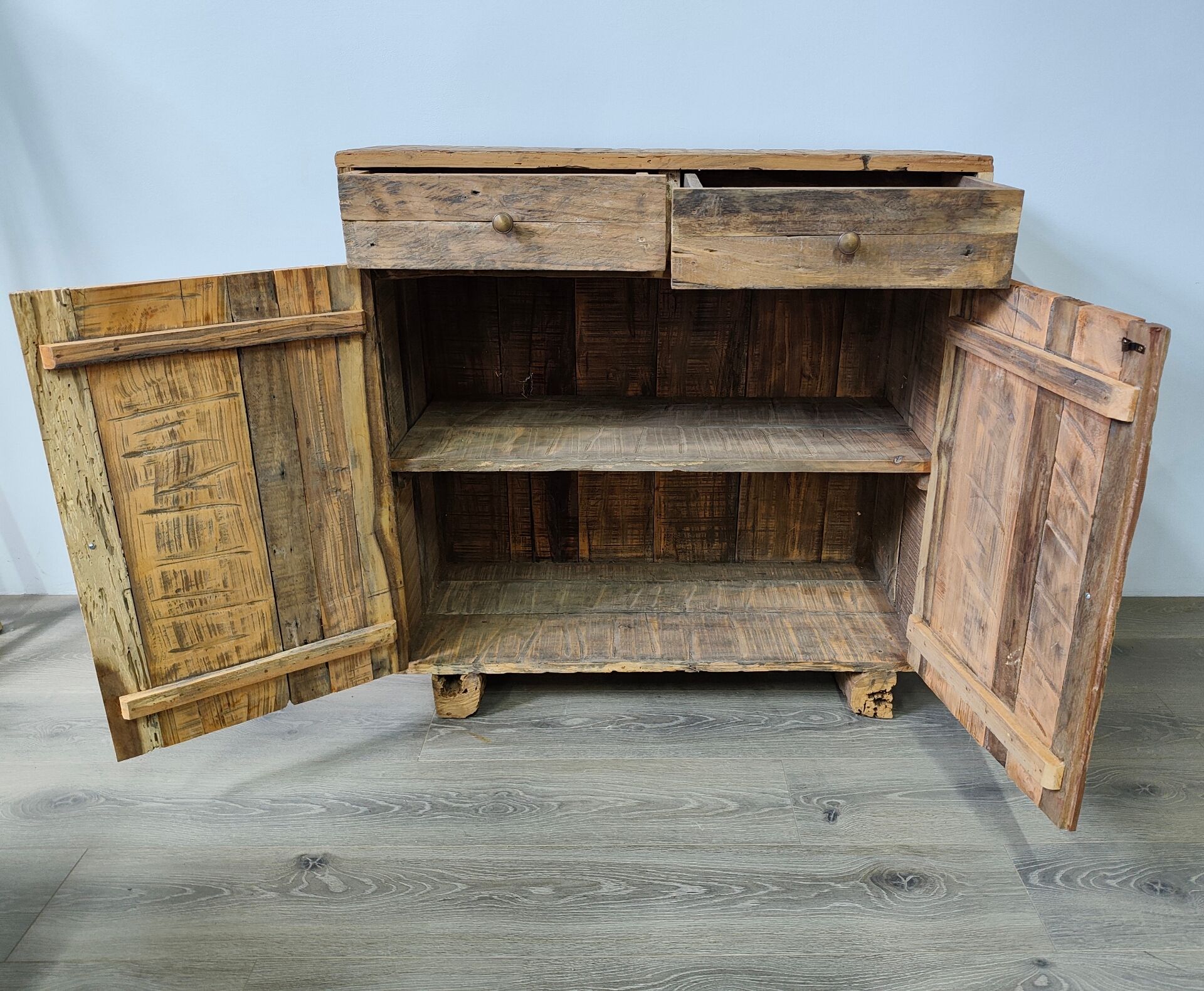 Two-door buffet with two drawers in antique wood.