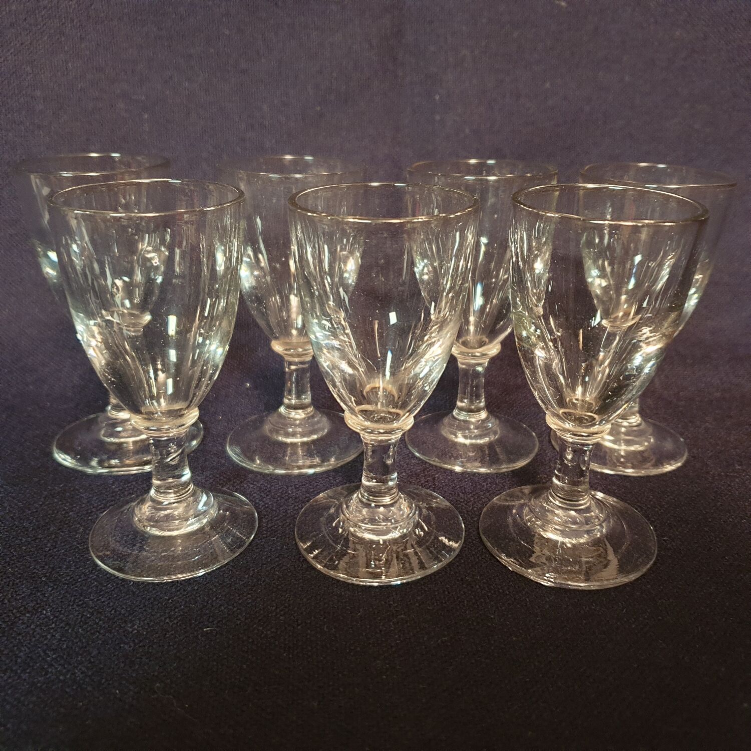 7 antique shot glasses