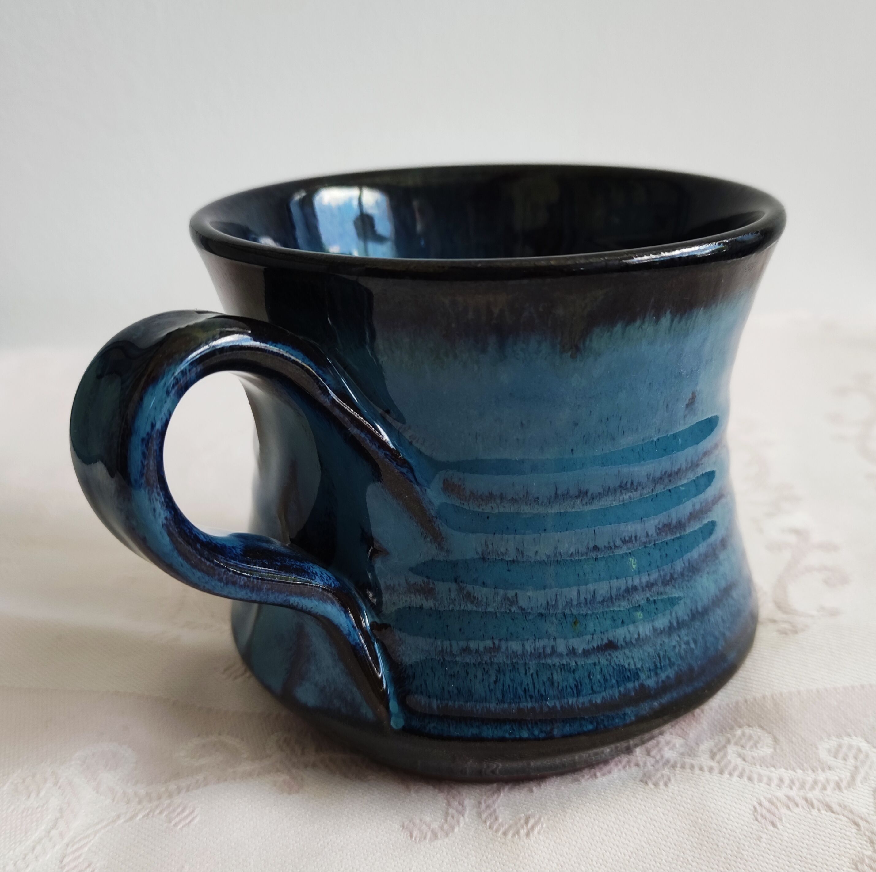 Blue enamelled terracotta mug