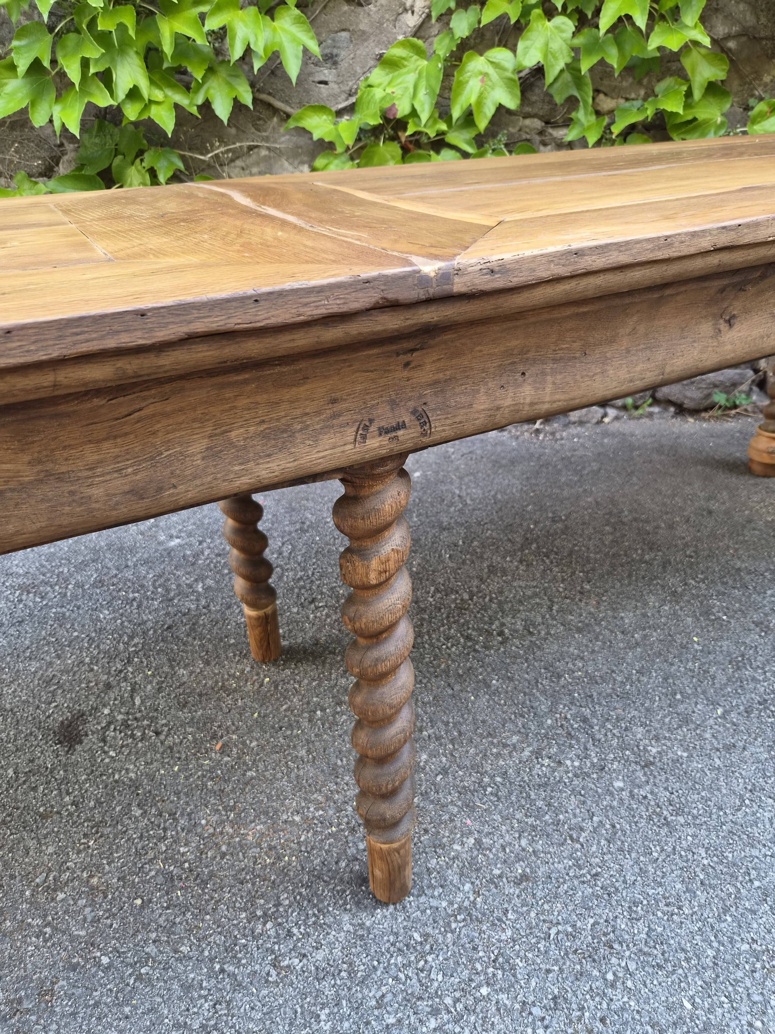 Antique French draper's table in oak, shop counter, work table, 6 feet, circa 1750–1850.