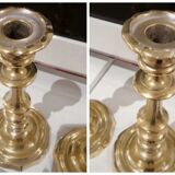 Pair of candle holders with punches