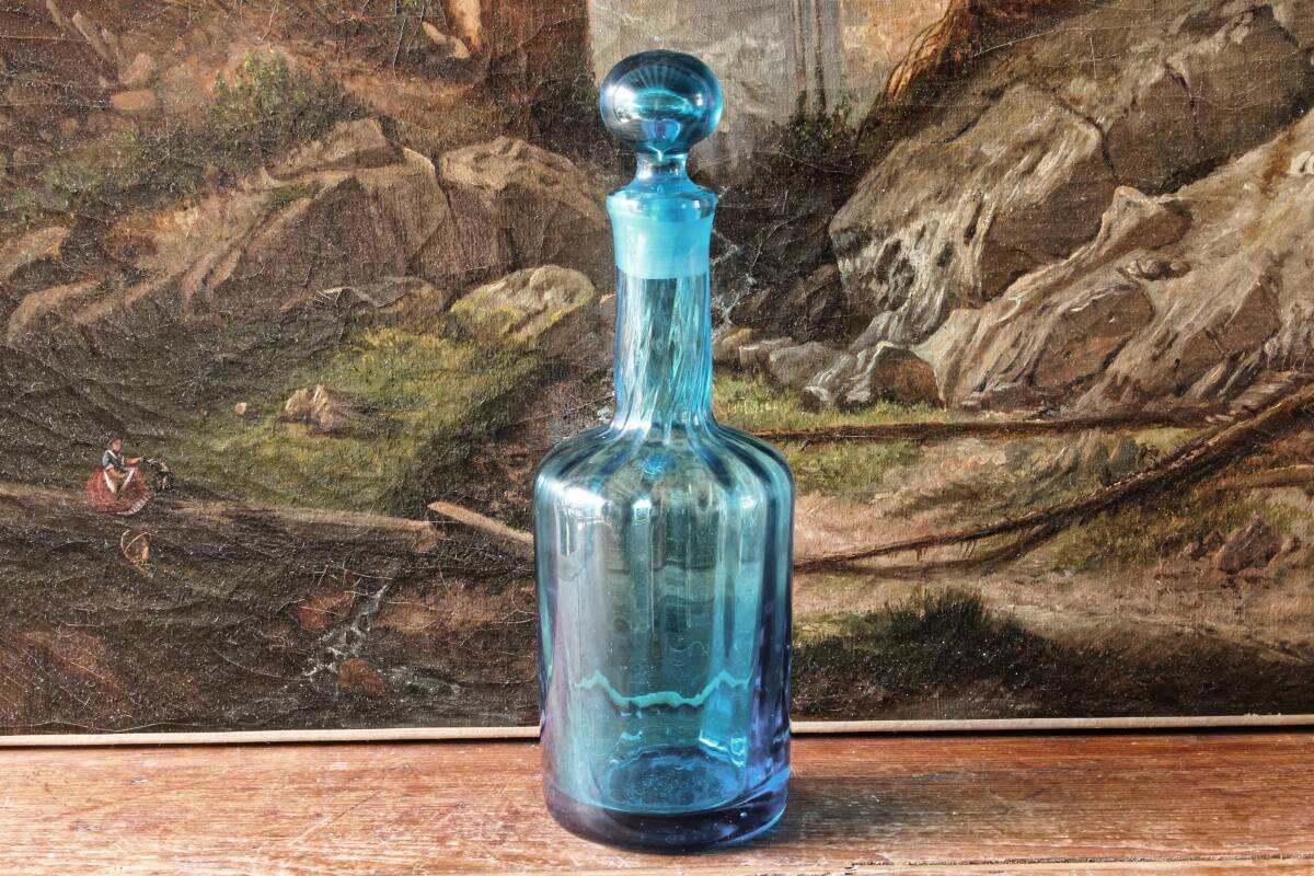 Large blown crystal bottle, twisted, turquoise blue, early 20th century.