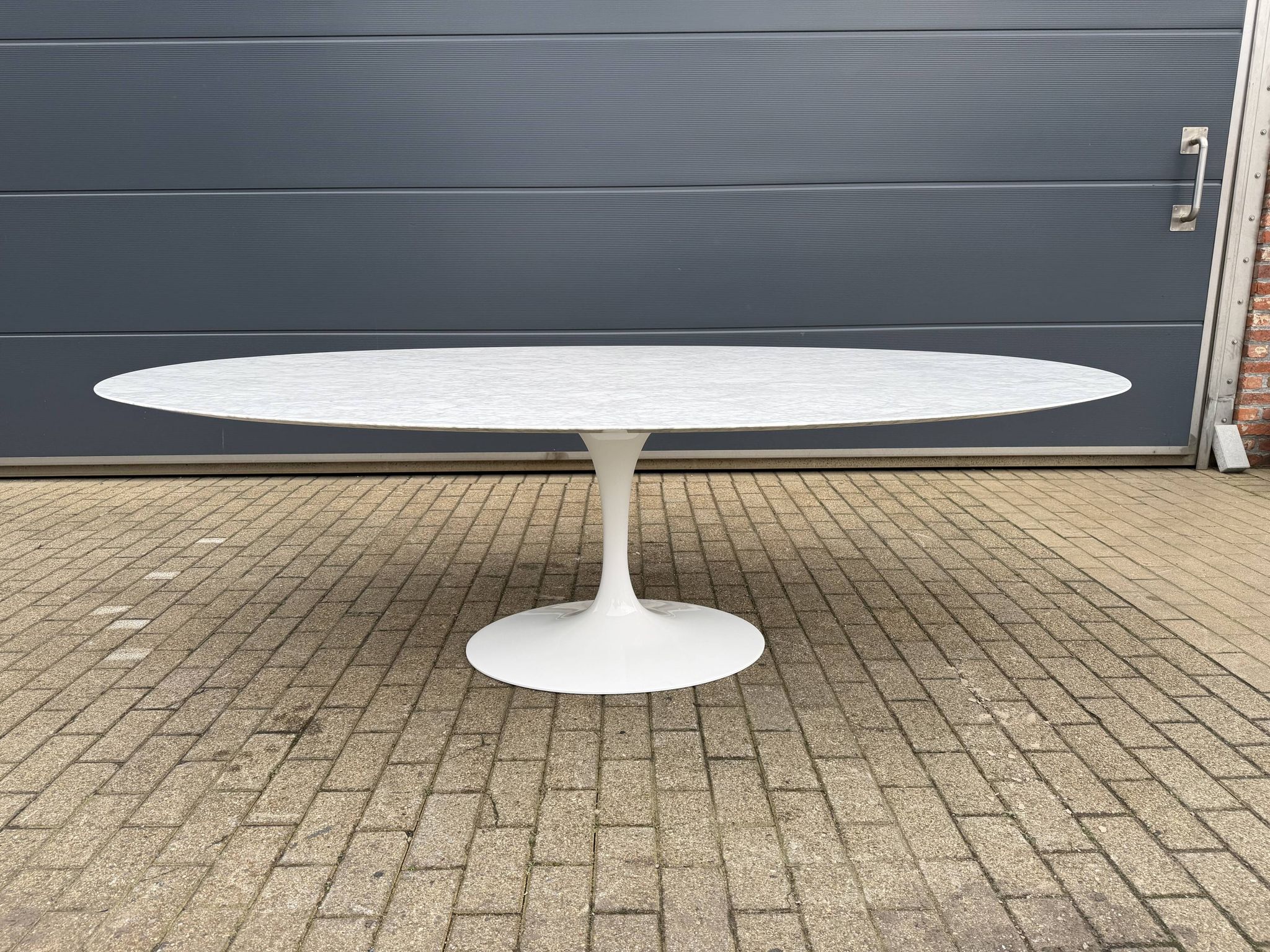 Original Knoll Tulip oval dining table (244cm) in Carrara marble.