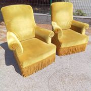 Pair of armchairs with golden velvet fringes