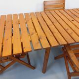 Vintage garden furniture set consisting of a table with extensions and 4 armchairs