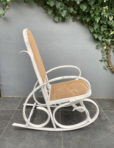 Old rocking chair with white patina