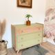1960s commode with tapered legs.
