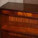 Pair of open low bookshelves Shaws of London in hardwood.