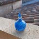 Perfume bottle in glass paste
