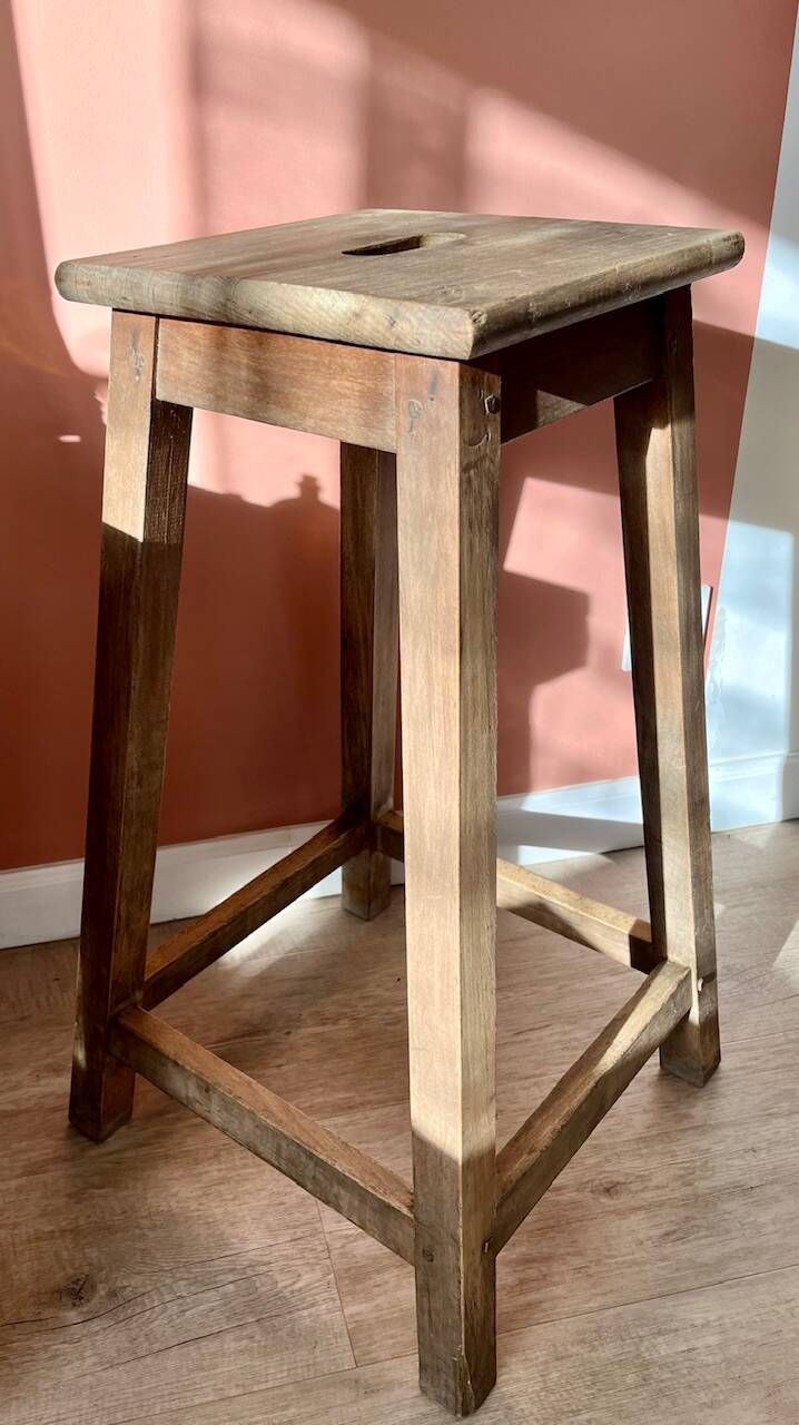 High wooden stool